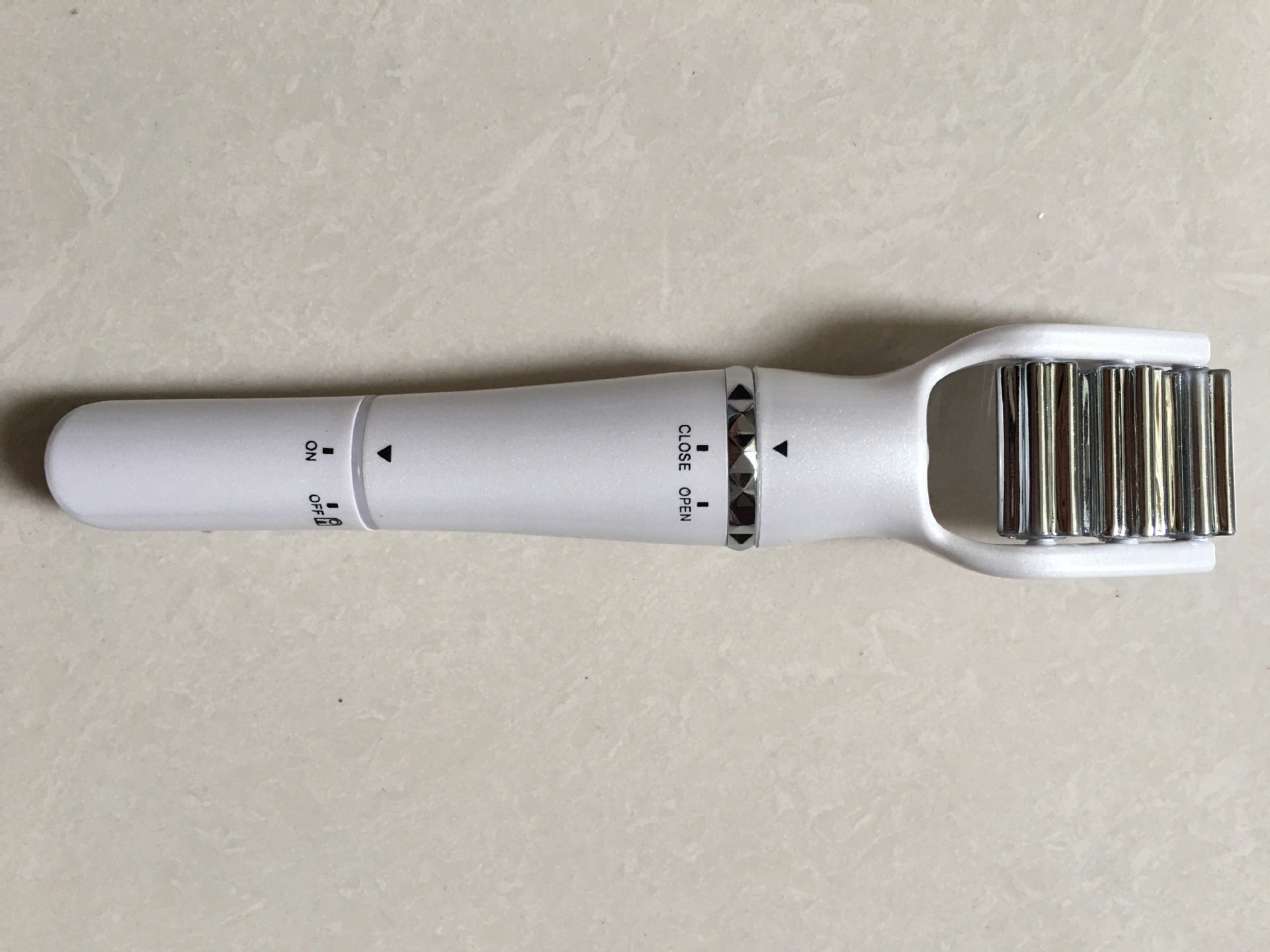 3D electric three-in-one roller face-lifting instrument